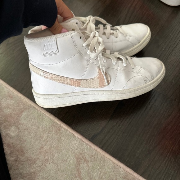 Lightly worn Nike high top sneakers. It has tan snakeskin pattern on it. - Picture 2 of 3